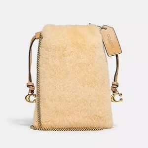 Coach natural shearling mini drawstring crossbody NWT